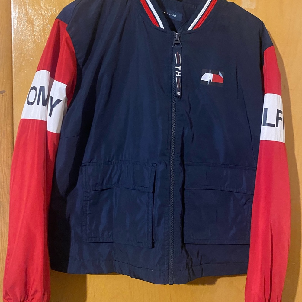 Tommy Hilfiger jacket size medium color blue, red,and white